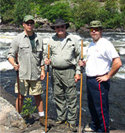 Three guys hiking at the French River in Canada